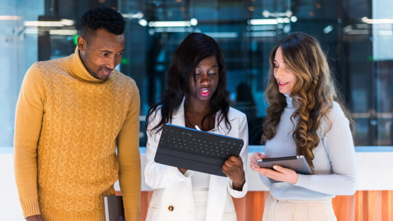 Multiracial group of people discussing business in an office